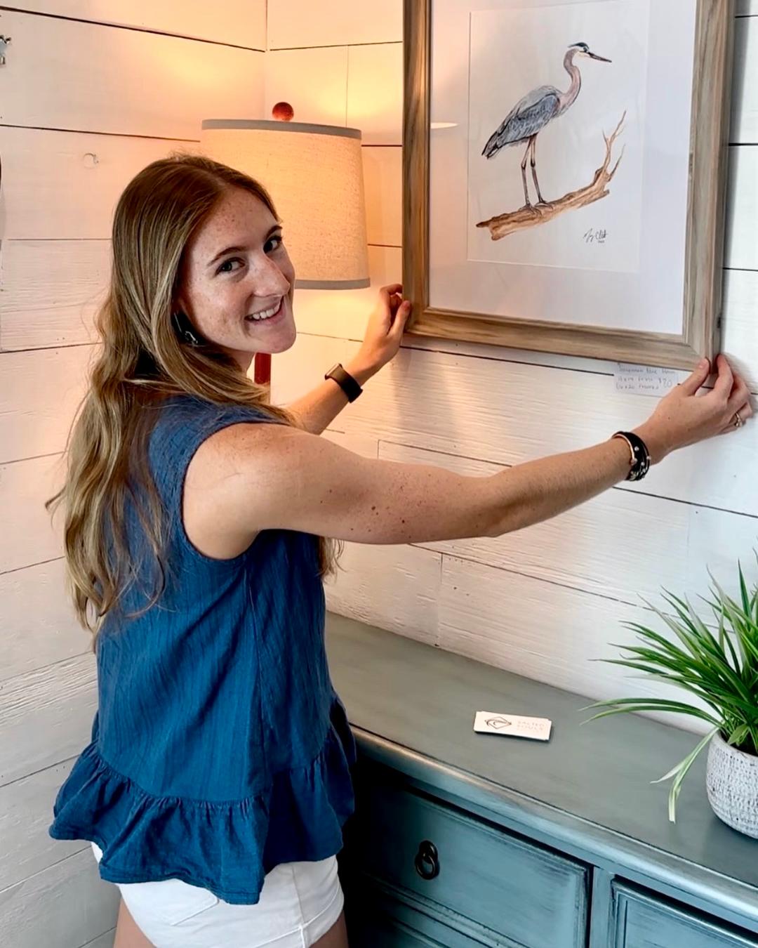 Macey Installing her artwork